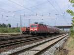 143 210-3 zieht ein RB11 Cottbus durch Eisenh�ttenstadt.