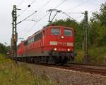 BR 151/176792/151-152-6-und-151-039-5-der 151 152-6 und 151 039-5  der DB Schenker Rail mit Kohlenzug fhrt 11.08.2011 auf der rechten Rheinstrecke Richtung Sden, hier kurz vor  Unkel.