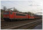 155 073-0 der DB Schenker Rail Deutschland AG fährt am 21.12.2013, mit der kalten 151 048-6 und einem Coil-Güterzug am Haken,vom Güterbahnhof Kreuztal in Richtung Hagen.
