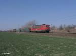 155 110-0 mit gedecktem G�terzug bei Podelwitz.