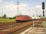 155 036-7 durchf�hrt Berlin-Sch�nefeld  mit ein kurzen Staubbeh�lterzug.