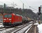 br-185-traxx-f140-ac1/245778/die-185-059-3-der-db-schenker Die 185 059-3 der DB Schenker Rail zieht am 19.01.2013 einen Kesselwagenzug durch den Bahnhof Betzdorf Sieg in Richtung Siegen.
