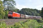 185 135-1 mit gemischtem Güterzug bei Urspring am 20.09.2012.
