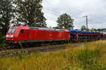 Die 185 058-5 (91 80 6185 058-5 D-DB) der DB Cargo AG fährt am 11 Juli 2024 mit einem langen beladen Autotransportzug (Wagen der Gattung Laaeks 553 der DB Cargo Logistics GmbH, ex ATG), durch Wilnsdorf-Rudersdorf (Kreis Siegen) in Richtung Siegen bzw. Kreuztal.

Nochmals einen lieben Gruß an den netten grüßenden Lokführer zurück, mich freuen immer die Grüße.

Die TRAXX F140 AC1 wurde 2002 von Bombardier in Kassel unter der Fabriknummer 33467 gebaut.