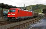 Die 185 388-6 (eine TRAXX F140 AC 2) der DB Schenker Rail Deutschland AG zieht am 23.04.2014 einen gemischten Güterzug durch den Bahnhof Betzdorf/Sieg in Richtung Köln.