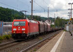 Die 185 285-4 (91 80 6 185 285-4 D-DB) der DB Cargo AG fährt am 09.06.2022 mit einem leeren Coilzug (Übergabezug) vom Rbf Kreuztal durch den Bahnhof Kreuztal in Richtung Hagen.