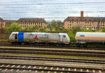 Die an die Retrack Germany GmbH (Hamburg) vermietete Railpool 186 540-1  Anton  (91 80 6186 540-1 D-Rpool) steht am 17.04.2023 mit einem Kesselwagenzug bei Würzburg.