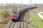 189 052-4 Railion mit Schüttgutganzzug mit Schotter beladen in Neu-Ulm Pfuhl am 09.04.2009.