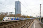   Zwei gekuppelte fünfteilige Bombardier Talent 2 (BR 9 442) der National Express Rail GmbH (NX Rail) erreichen am 26.11.2016, als RE 7  Rhein-Münsterland-Express  (Krefeld - Köln -