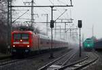 DB 112 177 mit dem SHE nach Hamburg durchfährt mit hohem Tempo Jübek bei Schleswig.