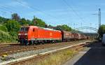  Die 185 044-5 der DB Schenker Rail Deutschland AG mit einem gemichtem Gterzug, beginnt am 12.06.2014 in Kreuztal ihre Reise in Richtung Hagen.