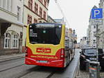 Heckpartie eines Mercedes Benz Citaro mit Werbung fr ein Bromaschinencenter des Nahverkehr Schwerin GmbH in der Gthestrasse.