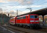 
Die 111 119-4 (91 80 6111 119-4 D-DB) der DB Regio schiebt den RE 9 (rsx - Rhein-Sieg-Express) Siegen - Köln - Aachen am 23.12.2015 vom Bahnhof Betzdorf/Sieg weiter in Richtung Köln. 

Die Lok wurde 1979 bei Krauss-Maffei AG in München unter der Fabriknummer 19851 gebaut, der elektrische Teil ist von Siemens.