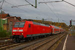   Die 146 005-4 (91 80 6146 005-4 D-DB) der DB Regio NRW fährt am 15.11.2020, mit dem RE 9 (rsx - Rhein-Sieg-Express) Dürren - Köln - Siegen, in den Bahnhof Betzdorf/Sieg ein.