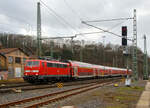 Die 111 158-2 (91 80 6111 158-2 D-DB) der DB Regio NRW erreicht am 30.01.2023, mit dem RE 9 rsx - Rhein-Sieg-Express (Aachen – Köln - Siegen), den Bahnhof Betzdorf/Sieg.