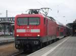 112 114-4 mit RE1 Park im Bahnhof Warnemnde.(07.08.10)