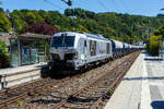 Die 248 059 alias DM4003 (90 80 2248 059-8 D-RHC), eine SIEMENS Vectron Dual Mode, der RheinCargo f�hrt am 28 Juli 2026 mit einem Kalkzug durch den Bahnhof Kirchen (Sieg) in Richtung K�ln.