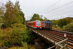 Ein ET 430 der S-Bahn Stuttgart auf Werkstattfahrt. Der vierteilige Elektrotriebzug 430 548 / 431 548 / 431 048 / 430 048 der S-Bahn Stuttgart (DB Regio AG -Baden-W�rttemberg) f�hrt am 21 August 2026 durch Siegen-Eiserfeld in Richtung K�ln. Hier �berquer sie wie so oft auf der Siegstrecke die Sieg, auch wenn es die Tage endlich mal etwas geregnet hat, so f�hrt die Sieg doch noch wenig Wasser.

Der Triebzug wurde 2012 von Bombardier Transportation GmbH in Hennigsdorf sowie in Aachen unter den Fabriknummern 26560 bis 26563 gebaut.

Nach urspr�nglichen Planungen der Hersteller sollte die Baureihe 430/431 bis Juni 2012 eine Zulassung erhalten haben. Dieser Zeitplan konnte jedoch nicht eingehalten werden. Die Fahrzeuge der Baureihe 430/431 erhielten am 21. Februar 2013 vom Eisenbahn-Bundesamt wegen Problemen mit der Mehrfachsteuerung zun�chst nur eine Zulassung f�r den Kurzzugbetrieb. Die Zulassung f�r Voll- und Langz�ge erfolgte am 25. M�rz 2013. Seit dem 8. April 2013 erfolgt die Abnahme durch DB Regio vom Hersteller Bombardier.