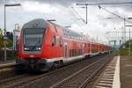   Steuerwagen voraus fhrt der RE 30  Main-Weser-Express , Verbindung Frankfurt (Main) Hdf - Gieen - Marburg Hbf - Treysa - Kassel Hbf, am 15.08.2014 in den Bahnhof Butzbach ein.