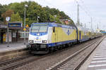 ME 146-08 macht gleich  HALT  im Tostedter Bahnhof.