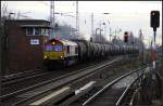 HGK DE 671 / 266 071-0 mit Kesselwagenzug Richtung Norden (geleast �ber HSBC Rail, Berlin Karow 25.11.2009)