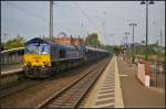HHPI 29 004 / 266 027-2  Dave Meehan  mit firmeneigenen Wagen der Gattung Faeeprrs 912 f�hrt am 05.09.2014 durch Uelzen