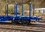 Detailbild von dem vierachsigen Drehgestell-Flachwagen mit Niederbindeeinrichtung, 37 80 4724 176-5 D-ERR, der Gattung Snps 7, der Vermietungsfirma ERR European Rail Rent GmbH (Duisburg), abgestellt