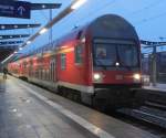 DABbuzfa 760 stand gemeinsam mit 143 589-0 als S3 von Rostock Hbf nach Gstrow im Rostocker Hbf.02.02.2013