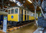 Die Zahnradlokomotive 1 der Wendelsteinbahn mit passenden Vorstellwagen in Abteilbauweise am 11.09.2022 in der Lokwelt Freilassing.