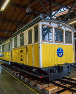 Die Zahnradlokomotive 1 der Wendelsteinbahn mit passenden Vorstellwagen in Abteilbauweise am 11.09.2022 in der Lokwelt Freilassing.
