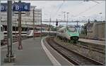 W�hrend der FS Trenitalia ER 610 004 als EC 47 Lausanne in Richtung Milano Centrale verl�sst, erreicht ein TGV Lausanne. Da der TGV von osten kommt, d�rfte es sich um eine Leerfahrt handeln, ev. der TGV Marseille - Lausanne.

20. August 2026