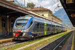   Zwei gekuppelte Minuetto Elettrico (ME063 und ME076) der Trenitalia stehen am 05.08.2019 im Bahnhof Domodossola, als Regionalzug nach Novara, bereit.