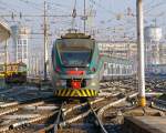   Zwei gekuppelte ETR 425 der Trenord am 29.12.2015 bei der Ausfahrt aus dem Bahnhof Milano Centrale (Mailand Zentral).