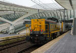 Die SNCB/NMBS HLD 7764 'Toledo' leistet am 23 November 2013, einem IC nach Ostende, vom Bahnhof Lüttch-Guillemins, Schubhilfe.

Nach der Ausfahrt vom Bahnhof Lüttch-Guillemins (Gare de Liège-Guillemins) in Richtung Brüssel, der  ...