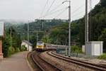 Serie 3000/364428/-der-ir-111-liers-- . Der IR 111 Liers - Luxembourg fhrt am nebeligen Morgen des 02.09.2014 in den Bahnhof von Kautenbach ein. (Zo)