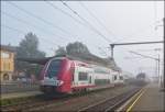 . Nebel in Ettelbrck - Am 01.08.2013 verlsst die Computermaus Z 2208 als IR 3733 Troisvierges - Luxembourg den Bahnhof von Ettelbrck, whrend die 4007 die RB 3233 Wiltz - Luxembourg in den Bahnhof zieht. (Hans)
