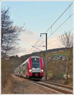 . In die andere Richtung geschaut - Eine Doppeleinheit Z 2200 durchfhrt als IR 3741 Troisvierges - Luxembourg das Dorf Michelau am 21.02.2013 (Jeanny)