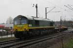 class-66-emd-jt42cwr/575528/railtraxx-266-031-verlaesst-mit-viel RailTraxx 266 031 verlässt mit viel Lärm und Regen Venlo am 18 März 2017.