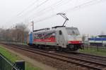 Railpool-Söldner 186 496 wirbt neue Lokführer für DB Cargo beim Ausfahrt aus Venlo am 24 März 2019.