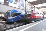 ET 301 Meridian 1430 001 Transdev und ÖBB 1116 229 Railjet in München Hbf am 09.11.2014.