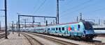 �BB Steuerwagen des Railjet im speziellen Outfit, welches Werbung f�r das Klima Ticket macht am Ende des Doppelzuges beim Ausfahren aus dem Bahnhof Wien in Richtung M�nchen. 03.05.2026