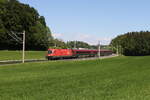 1116 168 mit einem  Railjet  aus Salzburg kommend am 12. Mai 2024 bei Axdorf.