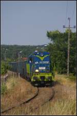 PKP Cargo SM31-130 / 8 620 060 schiebt am 09.07.2013 einen langen Zug Eaos-Wagen �ber das Verbindungsgleis auf den unteren Rangierbahnhof von Kostrzyn
