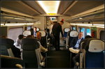 InnoTrans 2016 in Berlin: �berraschend ger�umiger Innenraum des Pesa Dart, PKP-Baureihe ED161 (2 150), der nicht nur im Mittelgang, sondern auch zwischen den Sitzreihen reichlich Platz bietet.