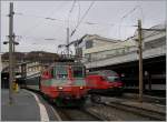 Die  Swiss-Express  Re 4/4 II 11108 mit einem IR nach Brig beim Halt in Lausanne. 
16. Oktober 2013