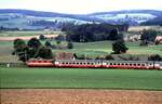 SBB Re 4/4 Swiss Express bei Fribourg am 25.08.1984.