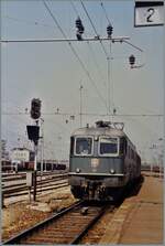 Die SBB Re 6/6 11646  Bussigny  mit einem Reisezug den Bahnhof von Domodossola, mehr Info gibt mein Fotoalbum leider nicht Preis, daf�r sind aus dem Bild einige Details zu sehen, wie z.B.