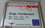 (151'802) - GLARNER BUS/Autobetrieb Sernftal-Haltestellenschild - Engi, Vorderdorf - am 23.