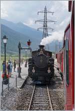 Bei der Ankunft in Oberwald mit dem Personenzug 241 zeigt sich mir die DFB HG 3/4 N° 9 welche ihrem Dampfzug 154 auf die Abfahrt wartet.

31. August 2019