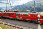 Der RhB ABe 4/4 III - 53  Tirano  Triebwagen am 06.09.2021 mit dem Bernina-Express (BEX) nach Tirano beim Halt in Alp Grüm, davor war noch der Triebwagen RhB ABe 4/4 III 51  Poschiavo .